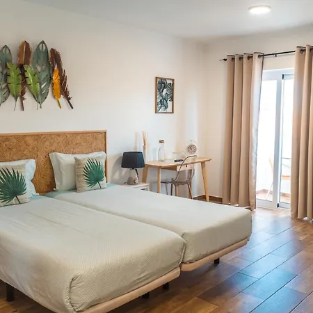 Sun - Surf Camp & Hostel